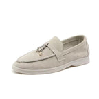 Chic women's leather moccasins with buckle detail