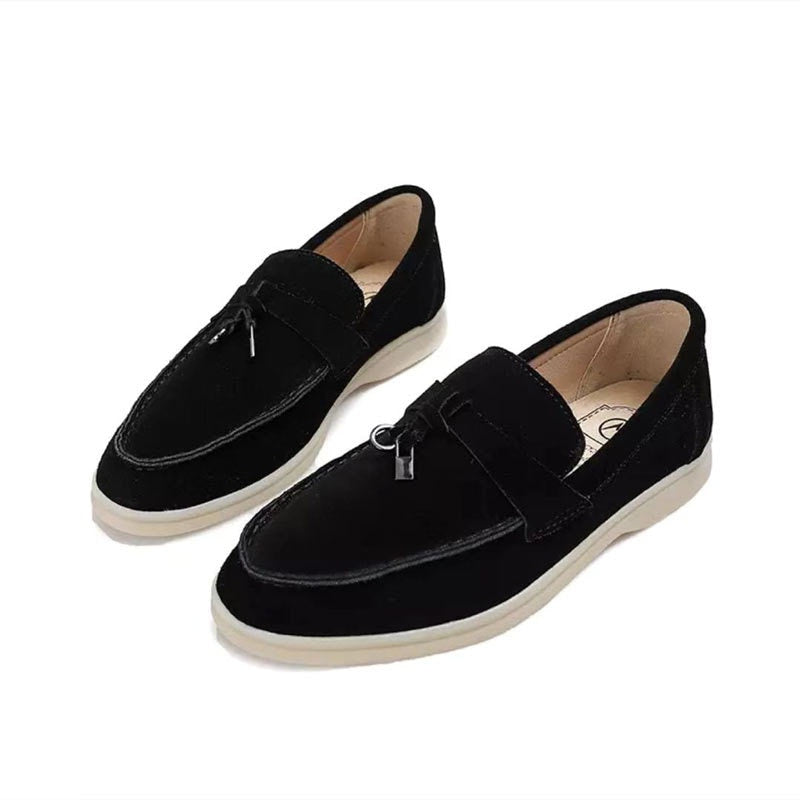 Chic women's leather moccasins with buckle detail
