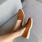 Chic women's leather moccasins with buckle detail