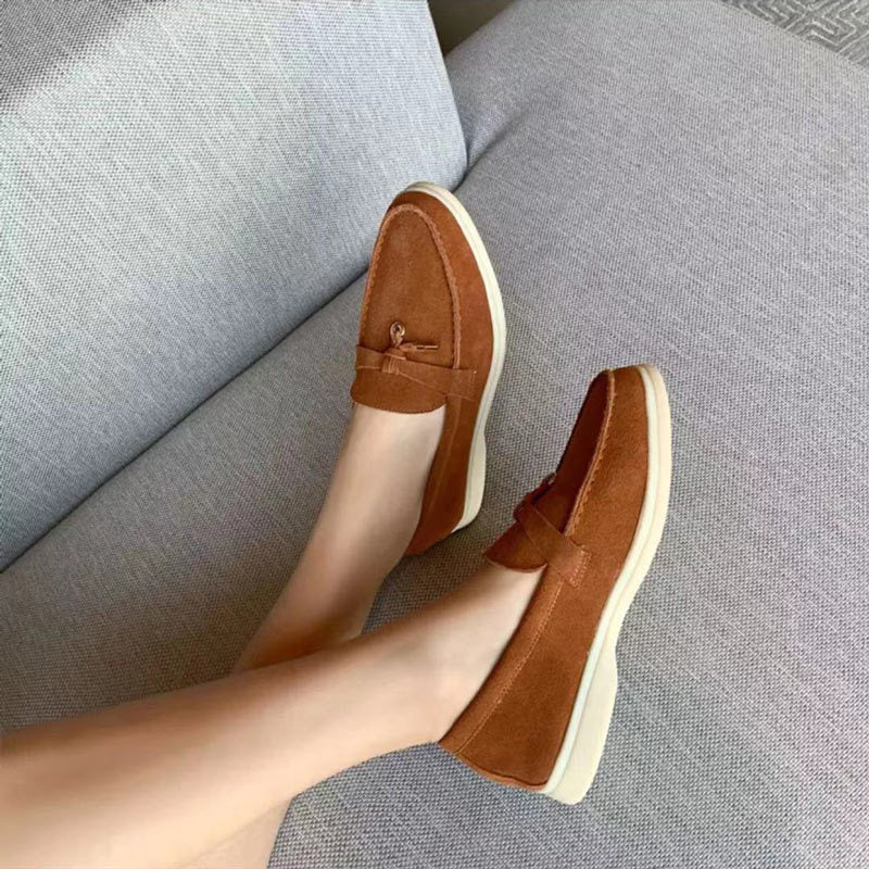 Chic women's leather moccasins with buckle detail