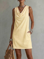 Sleeveless cotton dress with a draped neckline everyday style