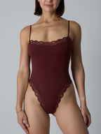 Corrigerende bodysuit met kanten afwerking