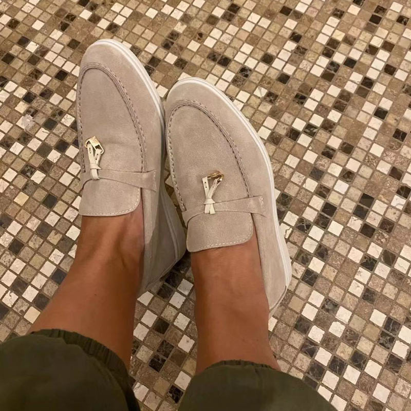 Chic women's leather moccasins with buckle detail